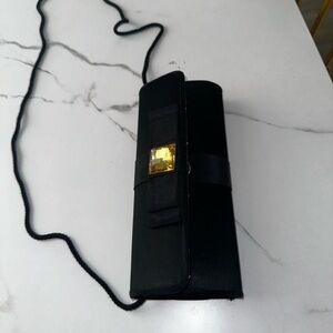 Elegant Black Clutch with Gold Accent